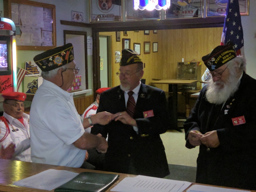 Nov. 19, 2016 at Cottage Grove VFW Post 8752: Chuck Cronquist presents Vets Camp challenge coins to 4th District Commander Robert Webster and VFW Minnesota State Commander Joe Mauricio. 